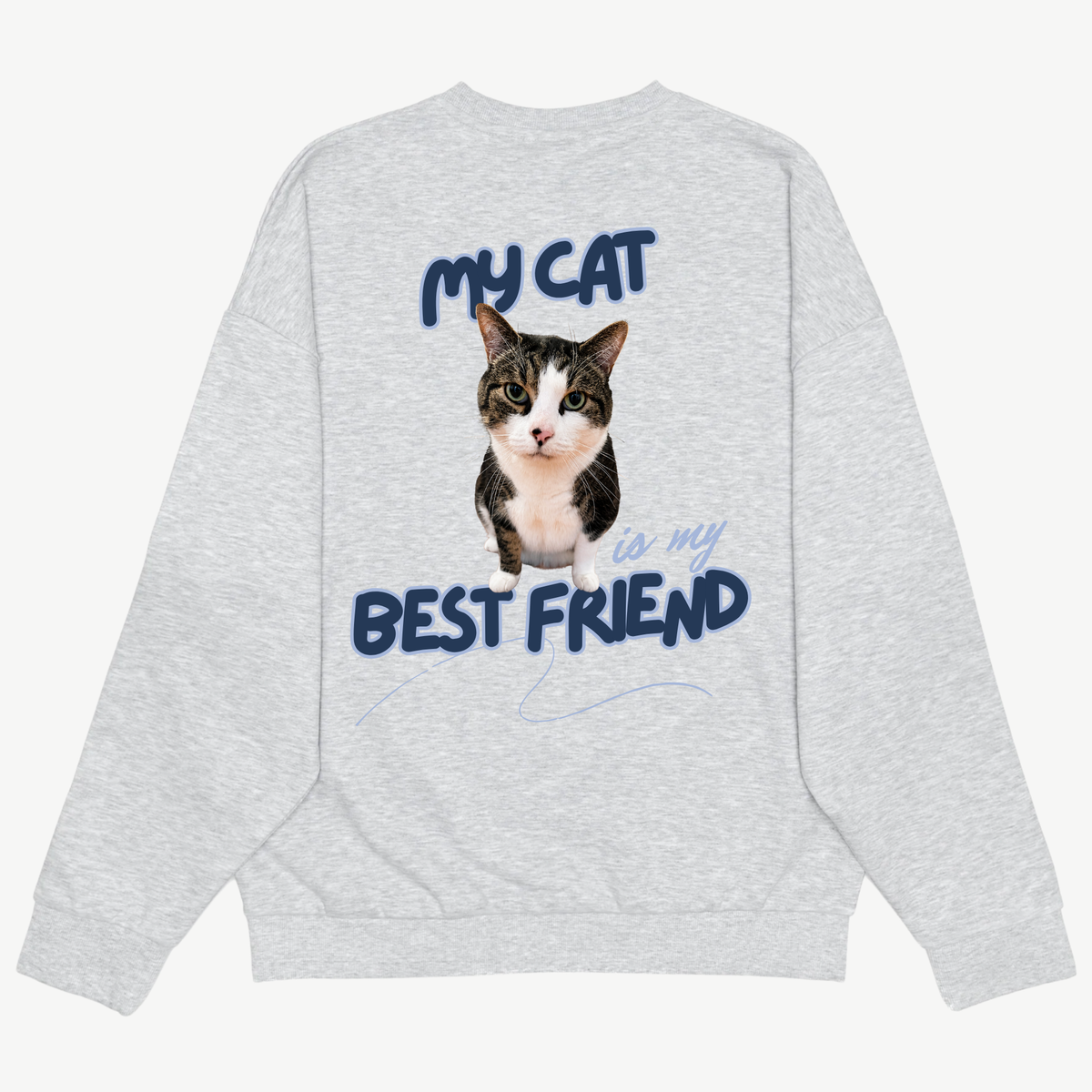 Back of a light grey crewneck with a cat portrait and navy “My cat is my best friend” lettering.