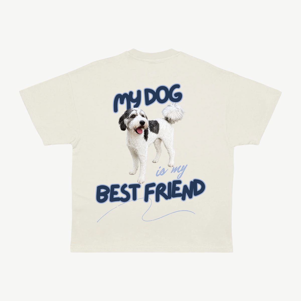 Back of a cream tee with a black-and-white dog portrait and navy “My dog is my best friend” lettering.