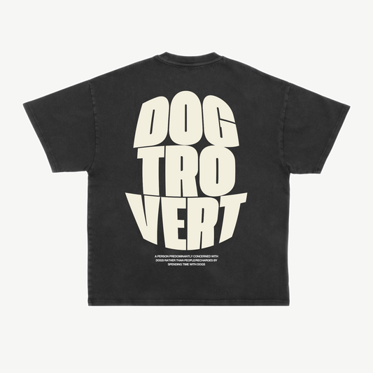 Back of a black tee with bold cream Dogtrovert lettering stacked in three lines.
