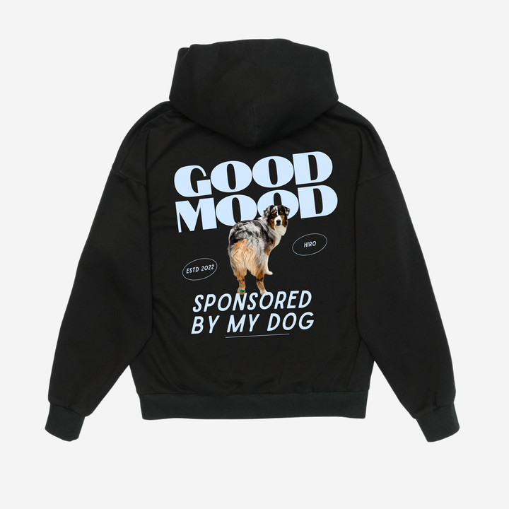 Back of a black Good Mood Hoodie with a dog portrait and pale blue lettering.