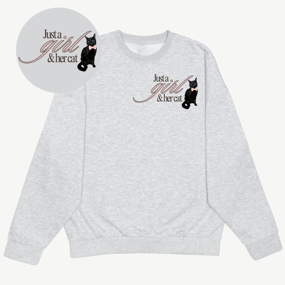 Front of a light grey custom crewneck with a black cat portrait and “Just a girl & her cat” chest print, plus an enlarged design detail.