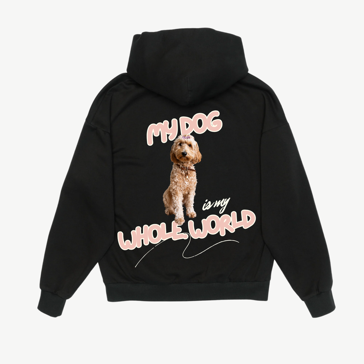 Back of a black hoodie with a brown dog portrait and pink “My dog is my whole world” lettering.