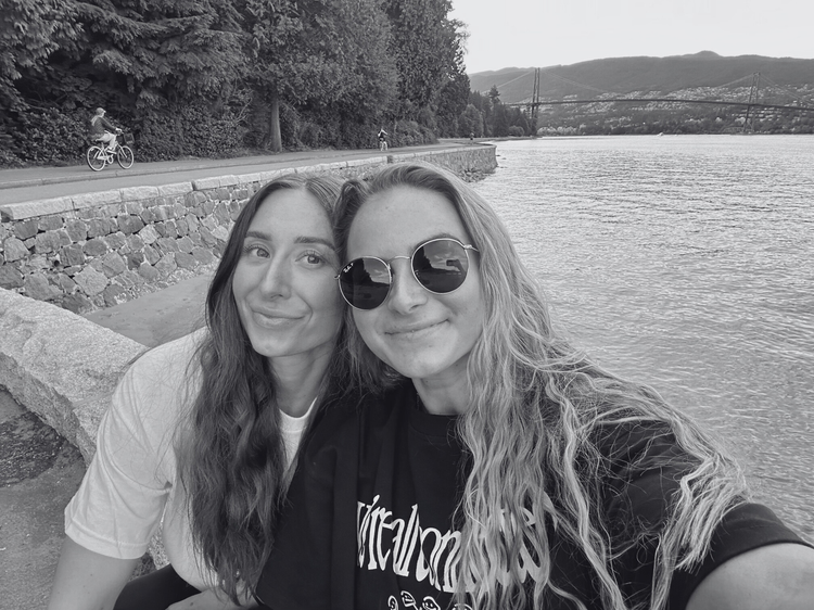 The For The Dogs Studios founders by the water